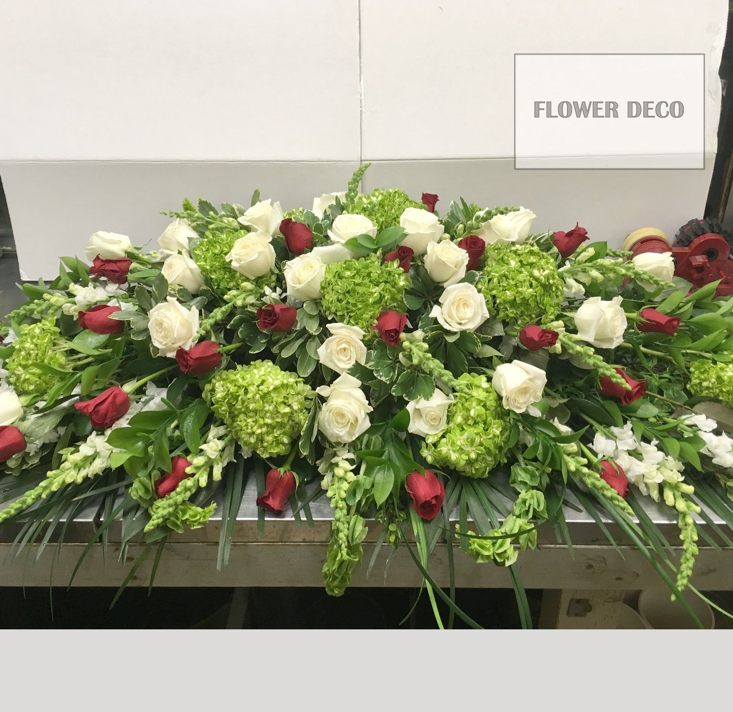 Casket Spray Mostly Green - Closed